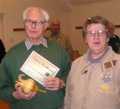 Tony Walton presents Frank Hayward with the certificate for turning of the month